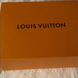 Peep toe Louis Vuitton heels.